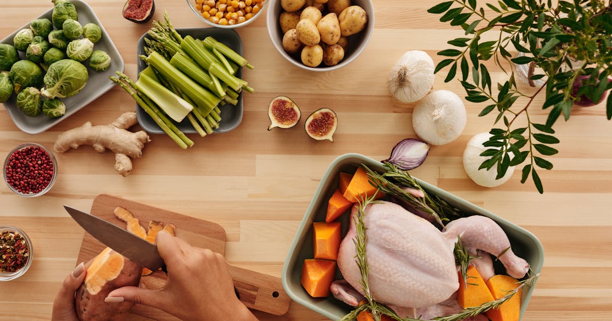 Fresh, affordable ingredients on a wooden table in a Swiss family kitchen